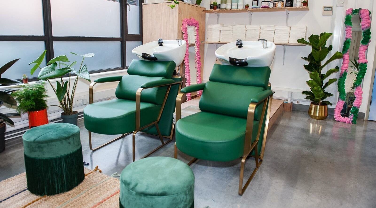 Luxury salon chairs and decor at Shag West, London, England, GB for a premium beauty experience.