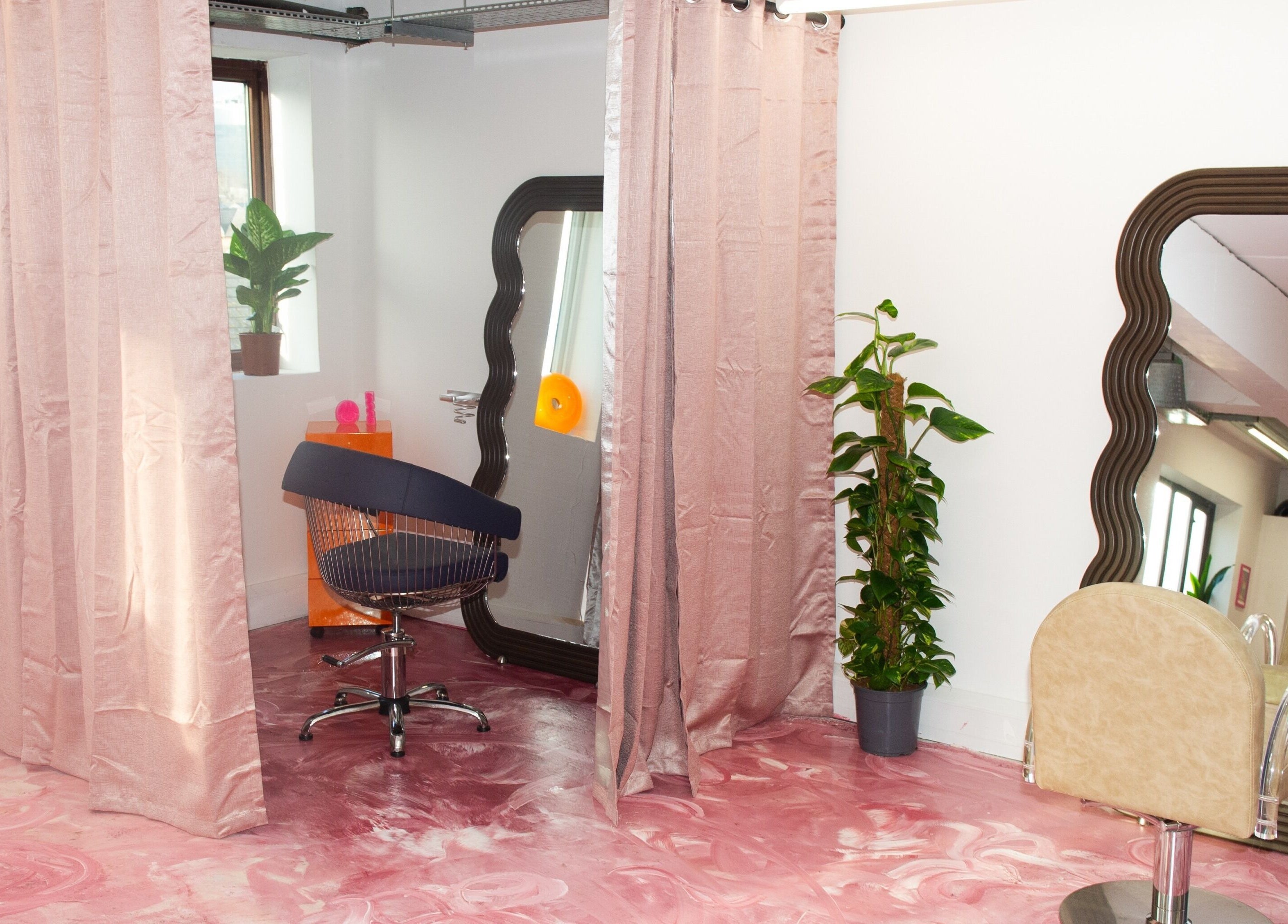 Trendy styling area with mirrors and plants at Shag East, London, England, GB.