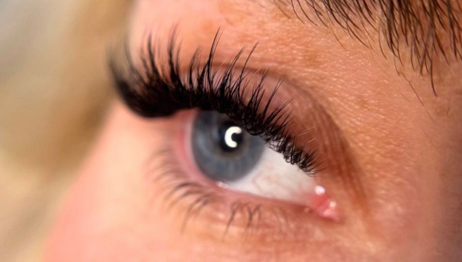 Close-up of eye with long lashes from The Honey Haus, Nottingham, England, GB. Enhancing natural beauty.