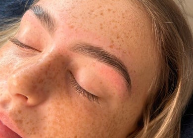 A serene face with groomed eyebrows at The Honey Haus, Nottingham, England, GB.