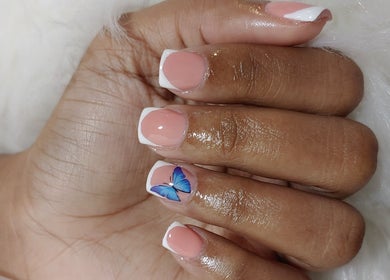 Elegant butterfly nail art at Angelic Beauty - Salon & Supplies Ltd, San Juan, TT.