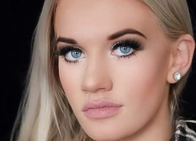 Close-up of glamorous makeup showcasing striking blue eyes at Meraki Beauty Bar, Boksburg, Gauteng, ZA.