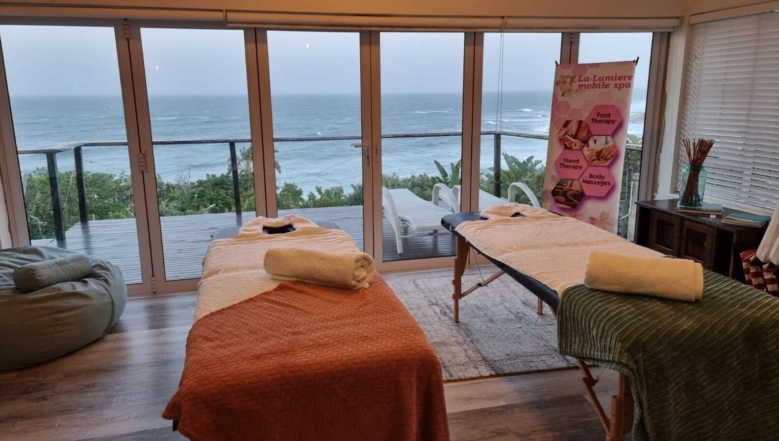 Relaxing oceanfront massage room at La-Lumiere Mobile Spa, Margate, Kwazulu-natal, ZA. Inviting ambiance.