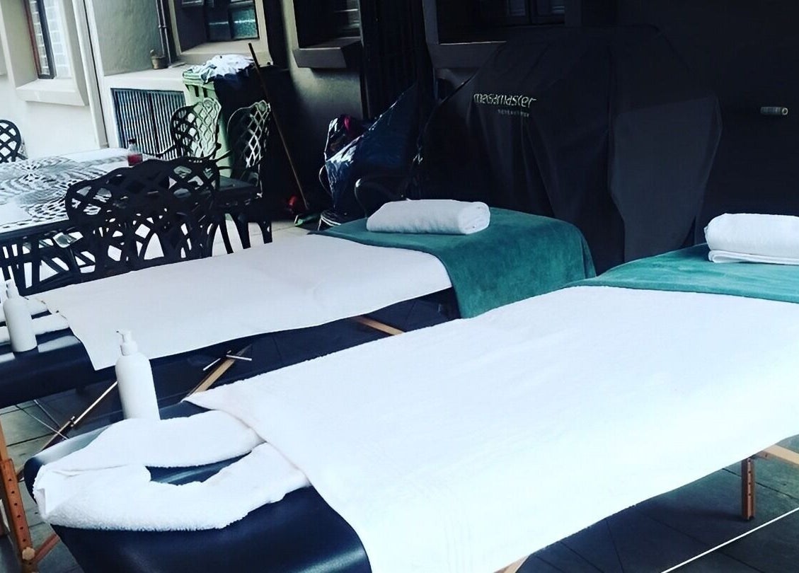 Outdoor spa setup at La-Lumiere Mobile Spa, Margate, Kwazulu-natal, ZA with massage tables and chairs.