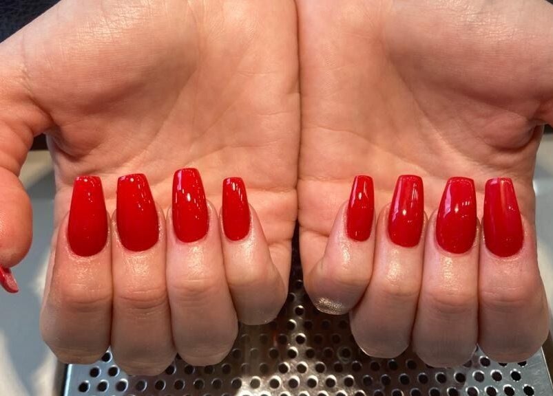 Stunning red nails service at Absolute Joy Spa, London, England, GB. Perfect manicure for elegance.
