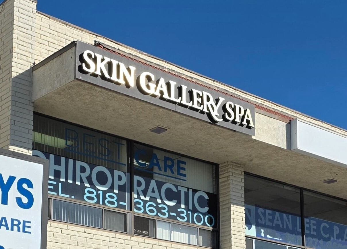 Exterior view of Skin Gallery Spa in Los Angeles, California, US, showcasing its welcoming signage.