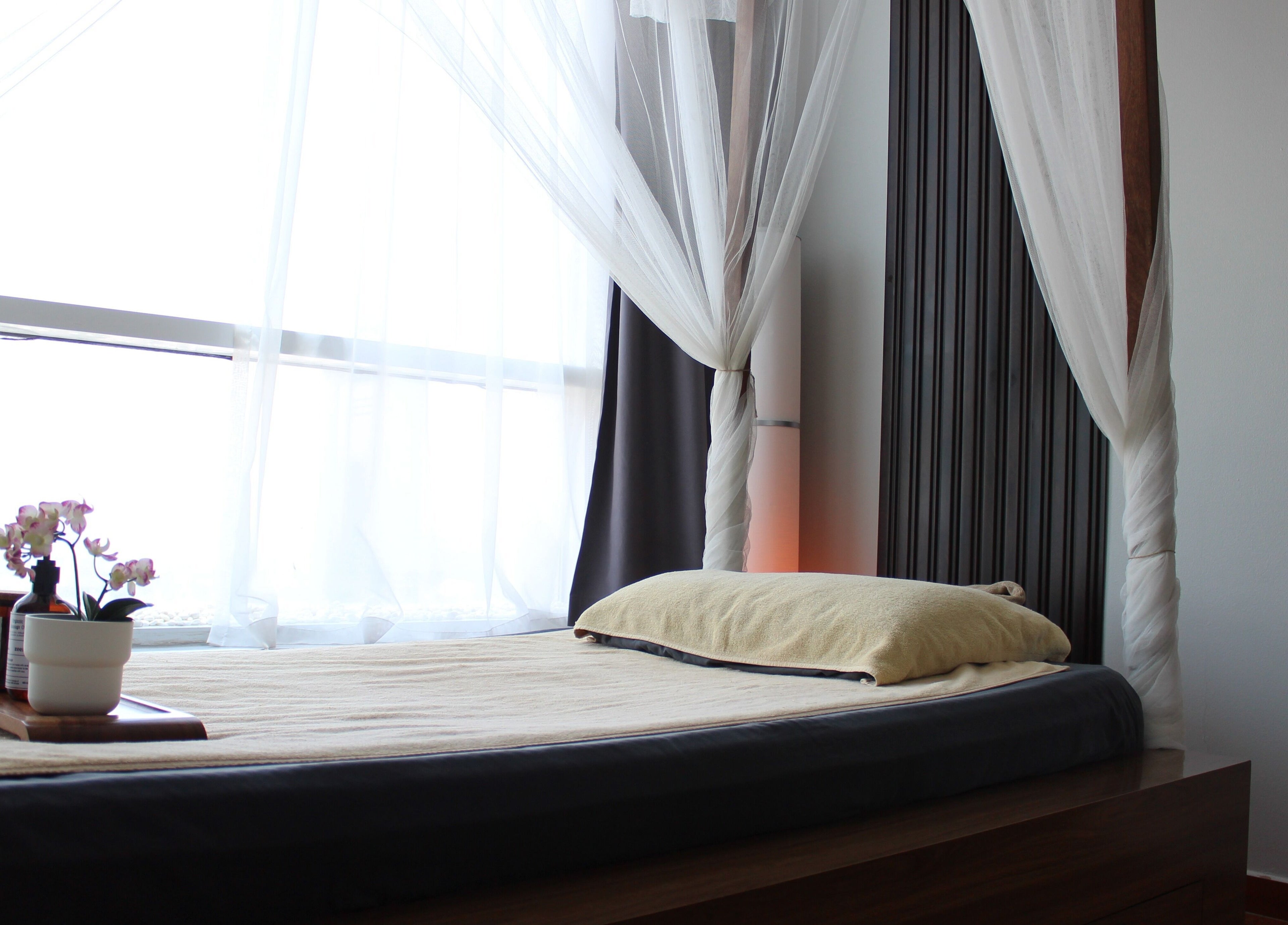 Luxurious massage room at Zeerla Spa Media City, Dubai Media City, دبي, AE with elegant decor and calming ambiance.