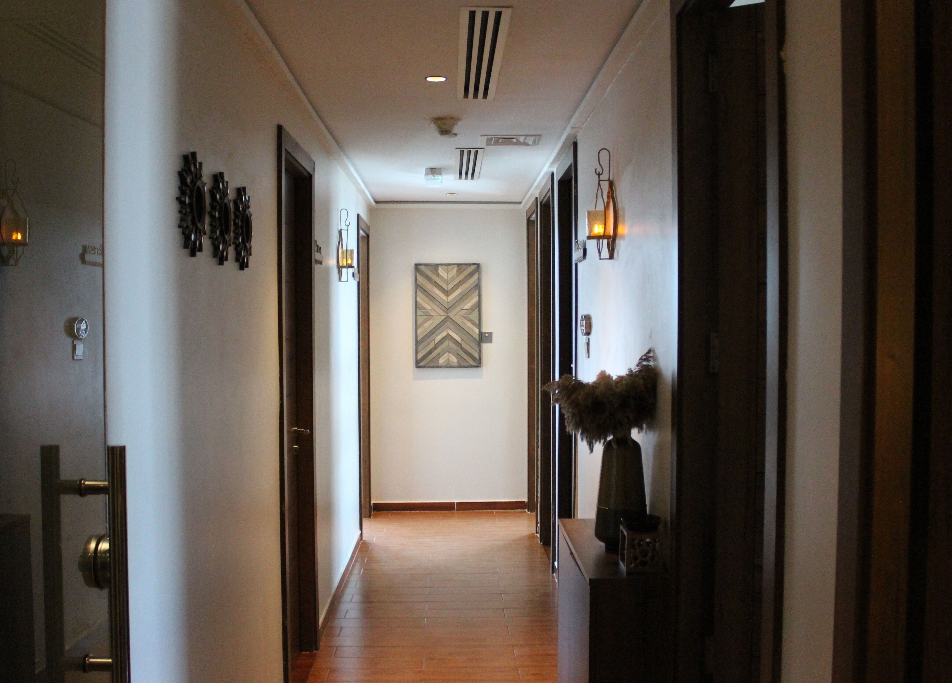Zeerla Spa Media City hallway in Dubai Media City, دبي, AE with soothing decor and ambient lighting.