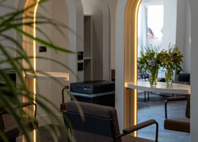 Elegant salon interior with floral decor at The Hive Hair • Beauty in St Austell, England, GB.