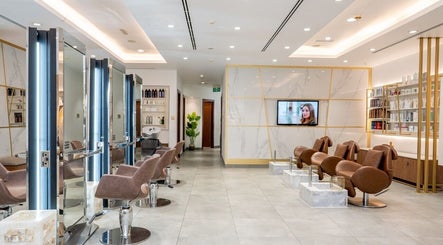 Spacious and modern interior at Legend Beauty Centre, Dubai, Dubai, AE showcasing luxurious salon chairs.