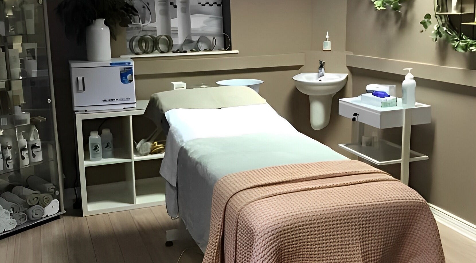 Serene treatment room at Ukiyo Holistic Center, Omagh, Northern Ireland, GB, featuring a plush bed and soothing decor.