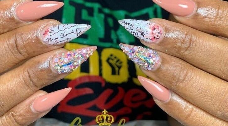 Elegant nail art with glitter and script at Gawdess Esthetics, Arima, Arima Borough Corporation, TT.