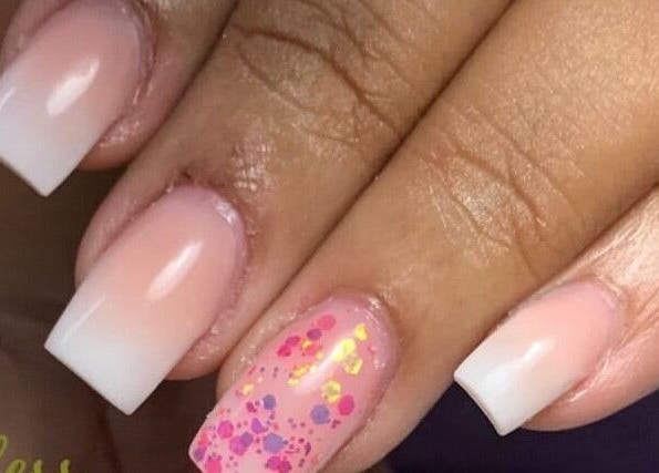 Elegant nail design with white tips and glitter at Gawdess Esthetics, Arima, Arima Borough Corporation, TT.