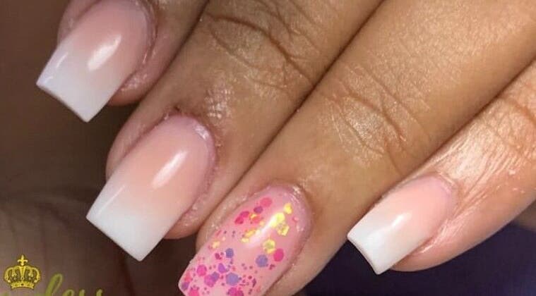 Elegant nail design with white tips and glitter at Gawdess Esthetics, Arima, Arima Borough Corporation, TT.