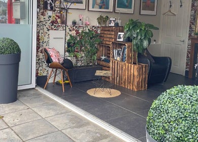 Inviting entrance of Severin Hair Studio in Teddington, England, GB with stylish decor and greenery.