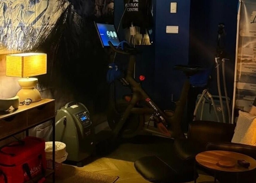 A cozy relaxation area with cycle equipment at The Wellness Lounge, Cardiff, Wales, GB.