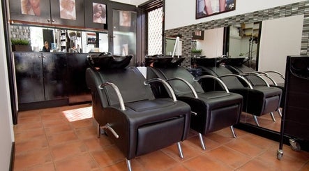 Elegant salon interior at Creations by Linda in Melbourne, Victoria, AU featuring modern styling chairs.
