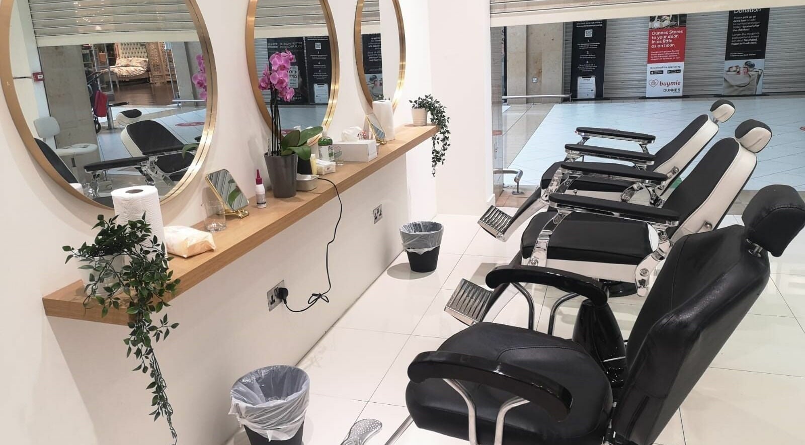 Modern salon chairs and mirrors at Begonia Beauty, Dublin, County Dublin, IE, showcasing elegant design.