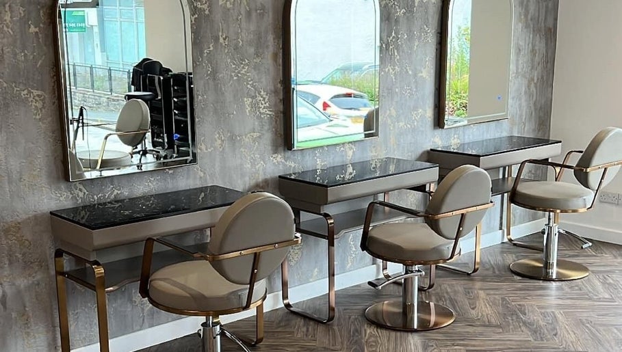 Chic salon chairs and mirrors at Jen Wilson Hair, Kirkintilloch, Scotland, GB, offering stylish hair services.