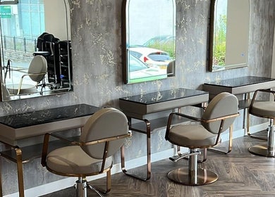 Chic salon chairs and mirrors at Jen Wilson Hair, Kirkintilloch, Scotland, GB, offering stylish hair services.