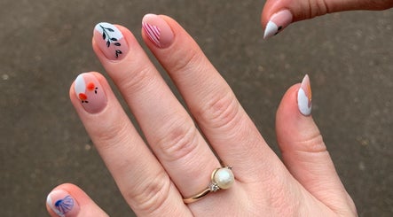 Intricate nail art design at Adorn Salon, Durban, KwaZulu-Natal, ZA, showcasing creative flair.