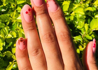 Vibrant cherry-themed nail art at Adorn Salon, Durban, KwaZulu-Natal, ZA. Perfect for stylish nail care.