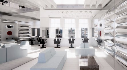 Spacious, sleek interior of SALT Salon Borough in London, England, GB with contemporary design and ample natural light.