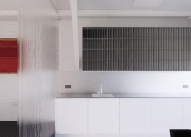 SALT Salon Borough's sleek modern interior in London, England, GB, featuring minimalist decor and art.