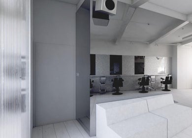 Minimalist interior of SALT Salon Borough with sleek chairs and mirrors in London, England, GB.