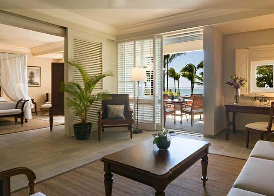 Elegant suite at The Residence Mauritius, Flacq District, MU with ocean view and refined decor.