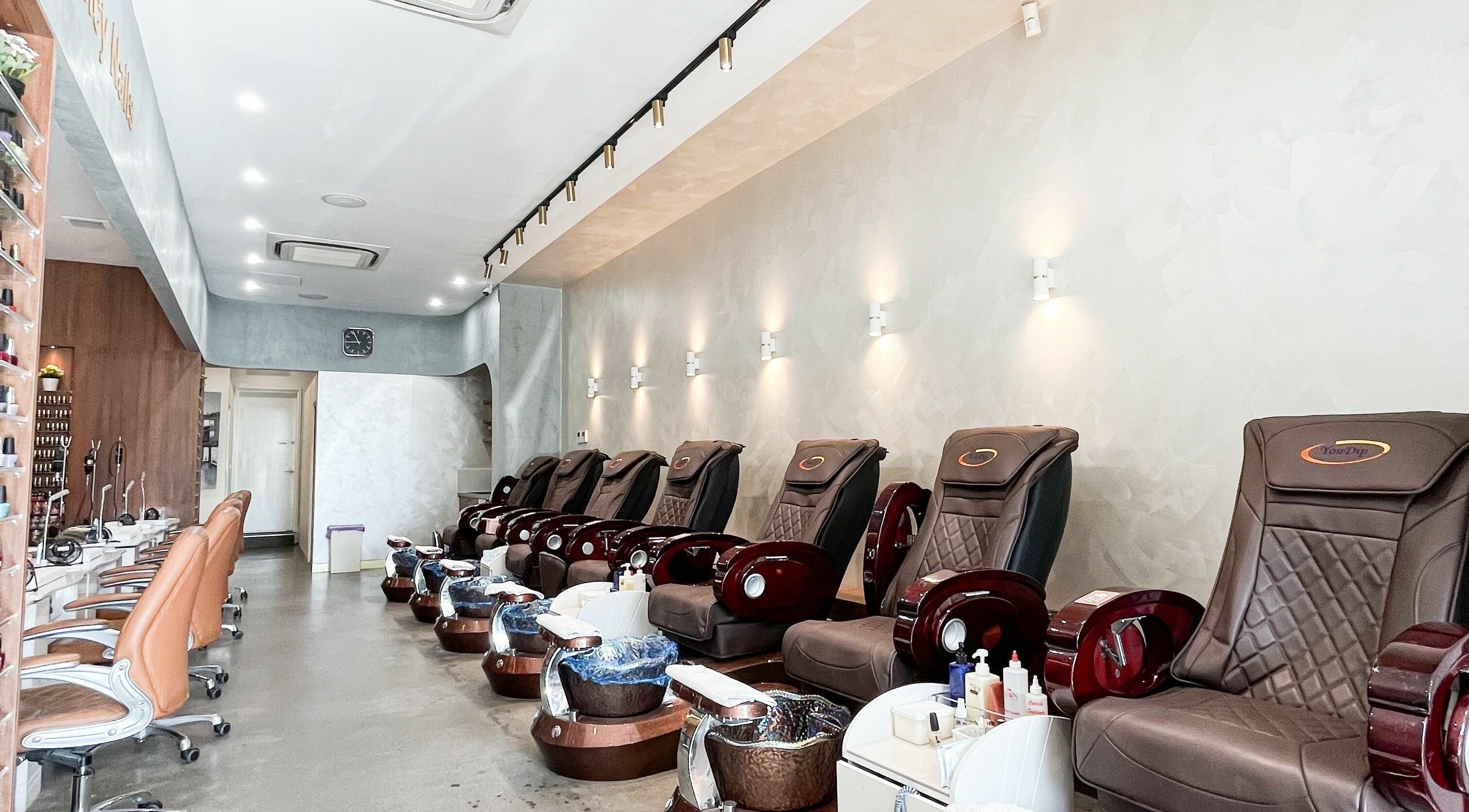 Sleek nail stations at Fancy Nails Salon, Richmond, Victoria, AU for ultimate relaxation.