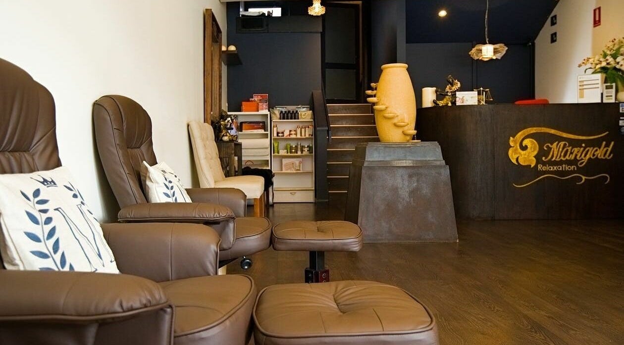 Inviting lounge at Marigold Relaxation in Melbourne, Victoria, AU, featuring comfortable seating and elegant decor.