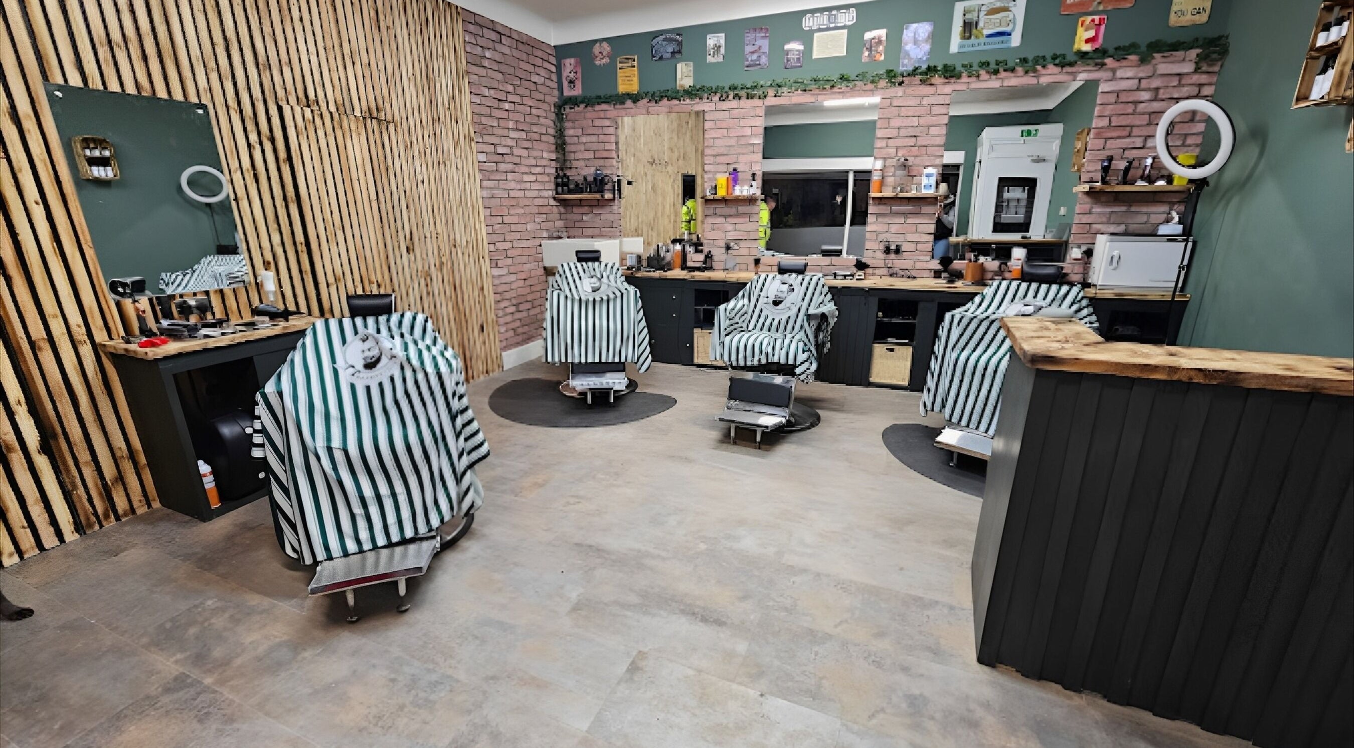 Sleek interior of Prestige Barbers in Bebington, England with modern chairs and rustic decor.