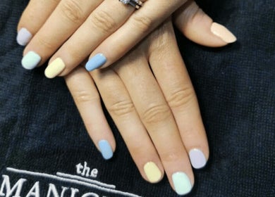 Close-up of pastel manicured nails at Skinsense, Crawley, England, GB.