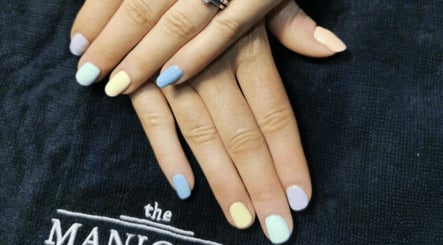 Close-up of pastel manicured nails at Skinsense, Crawley, England, GB.