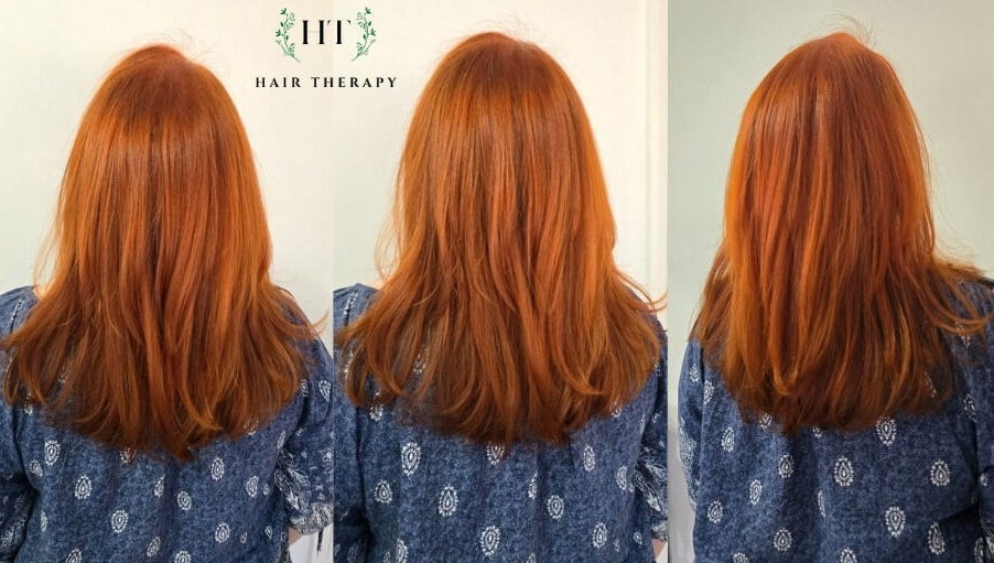 Lustrous red hair transformation at Hair Therapy Knysna, located in Knysna, Western Cape, ZA.