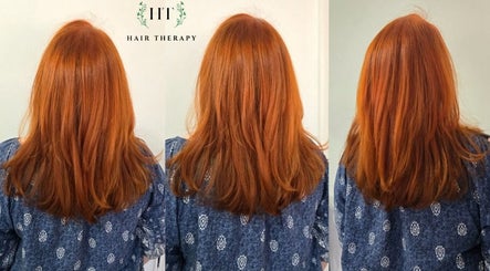 Vibrant red hair transformation at Hair Therapy Knysna, Knysna, Western Cape, ZA. Discover new styles.