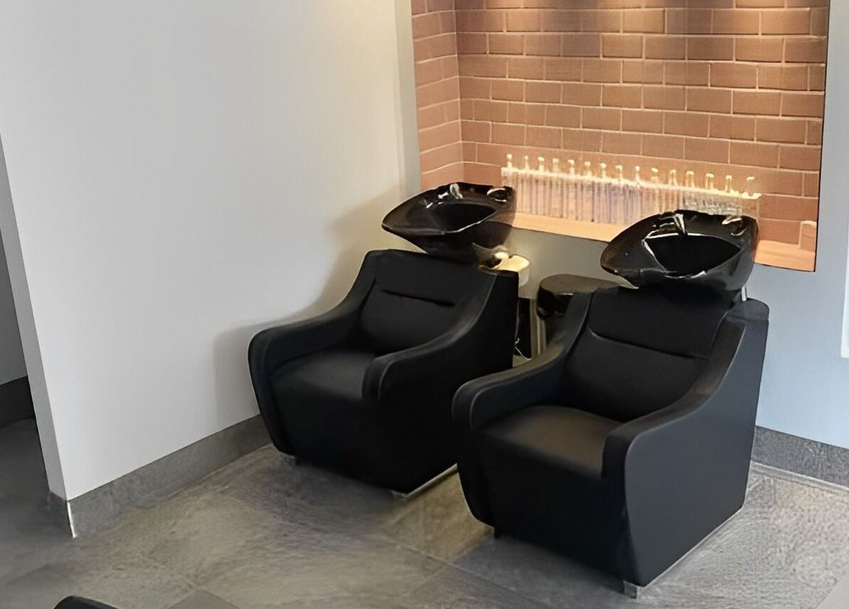 Sleek hair wash stations at Ego Hairdressing, Milngavie, Scotland, GB. Modern salon interior design.