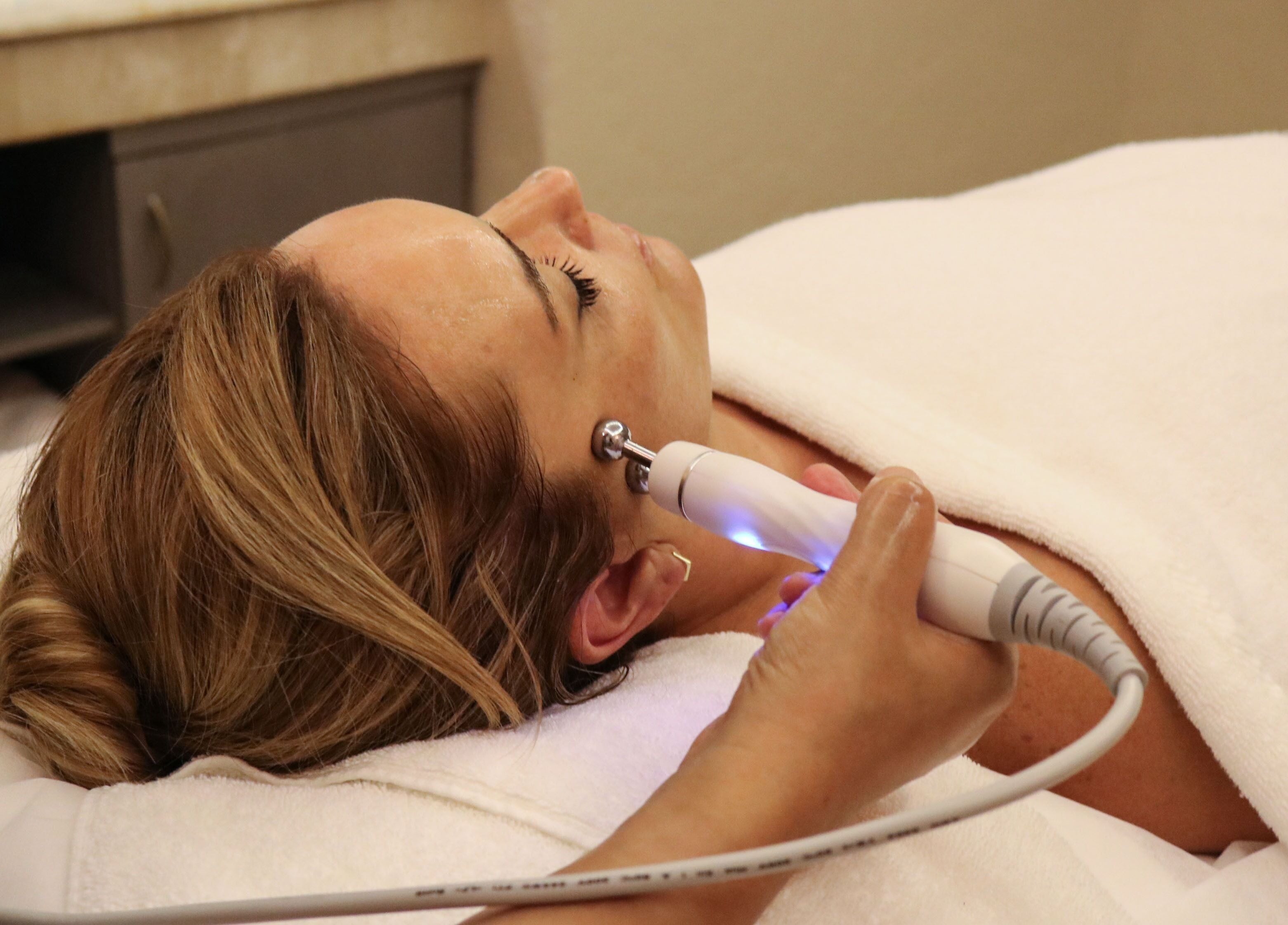 Facial treatment at Wellbeings Holistic Healing - Fairmont, Dubai, enhancing relaxation in Dubai, AE.