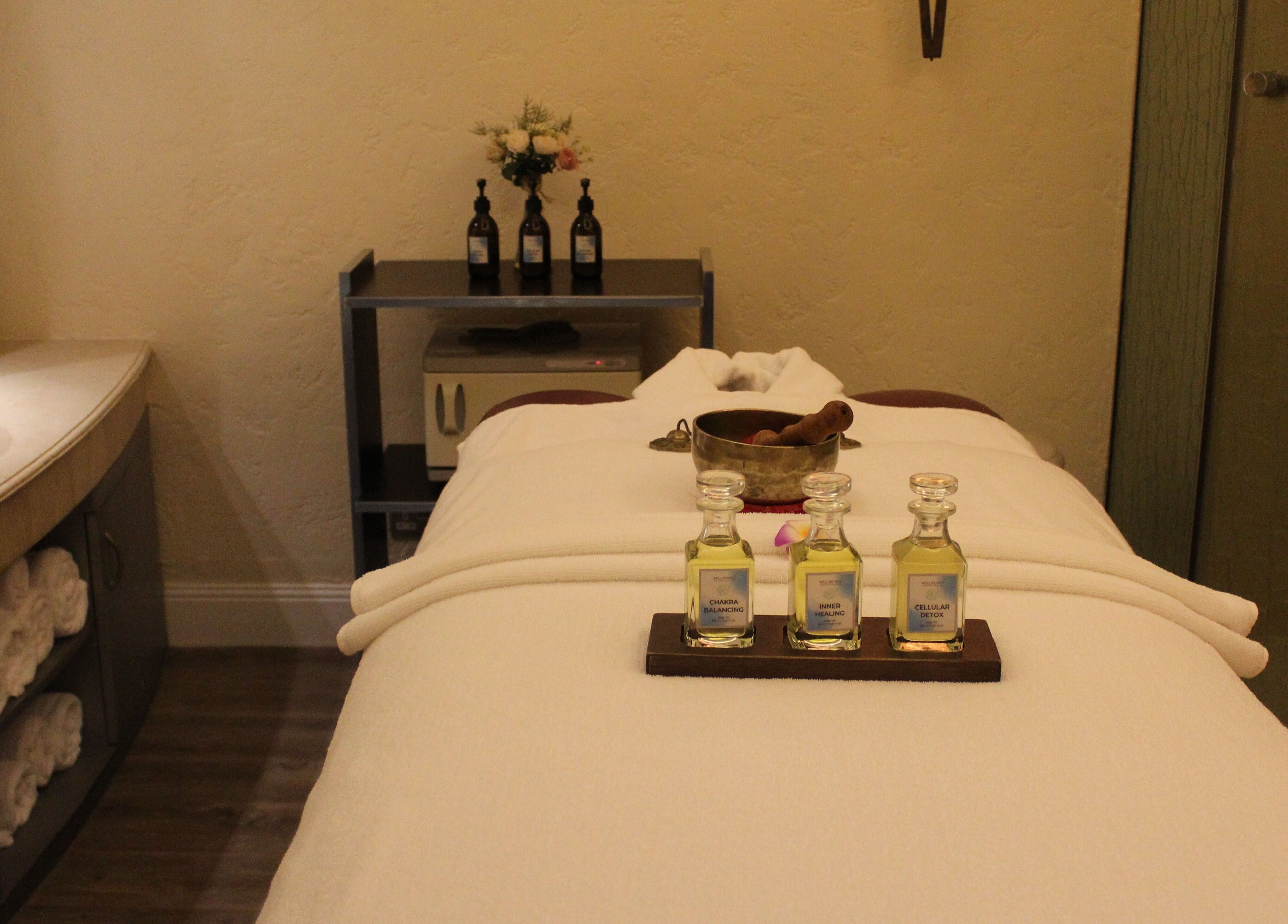 Elegant spa room at Wellbeings Holistic Healing - Fairmont, Dubai showcasing essential oils, Dubai, AE.