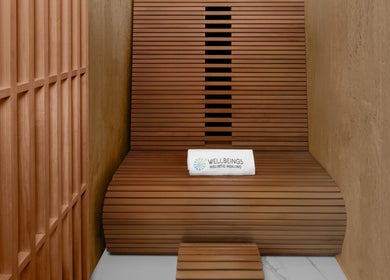Relaxing wooden sauna at Wellbeings Holistic Healing, Hotel Indigo Dubai, offering serene wellness in Dubai, Dubai, AE.