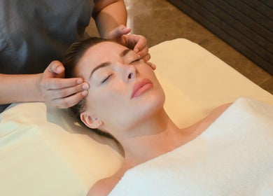 Relaxing massage therapy at Wellbeings Holistic Healing, Hotel Indigo Dubai, promoting wellness in Dubai, Dubai, AE.