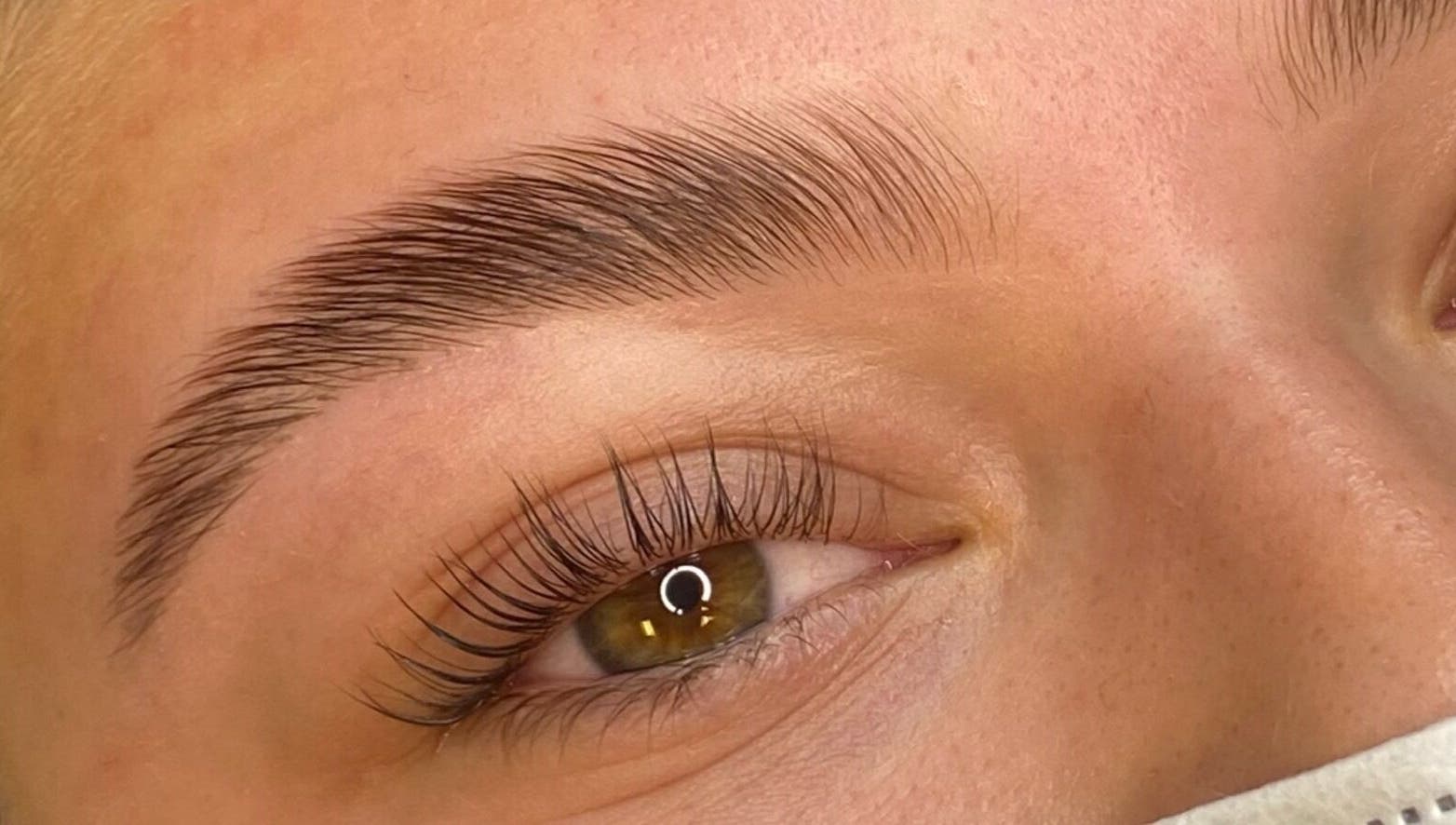 Perfectly groomed eyebrow at Selkie Skin, Mevagissey, England, GB, enhancing natural beauty.