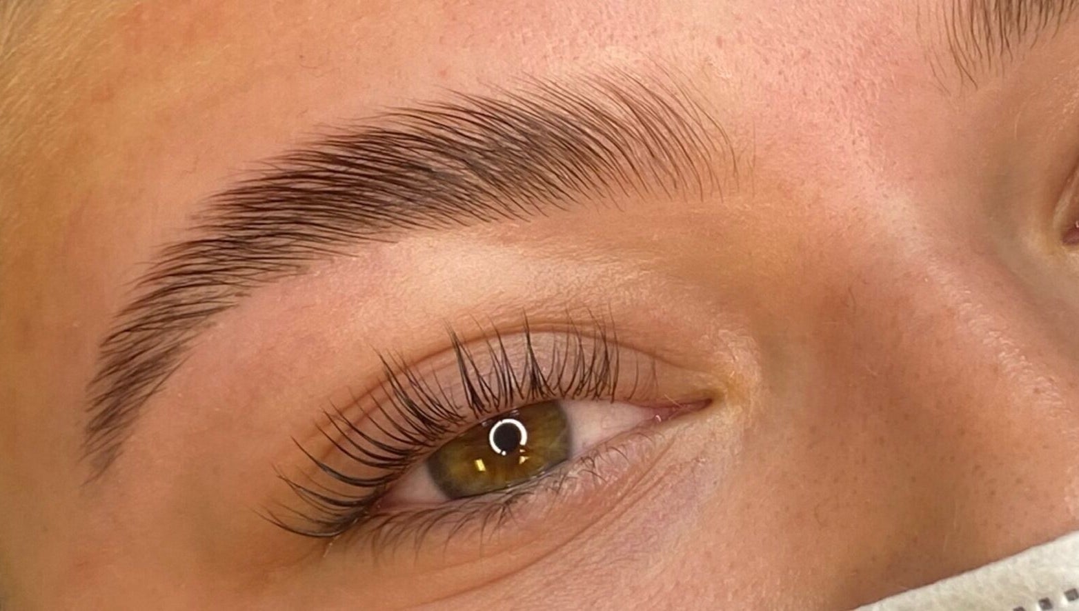 Perfectly groomed eyebrow at Selkie Skin, Mevagissey, England, GB, enhancing natural beauty.