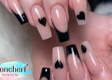Elegant nail art with black heart design at Moncheri Hand & Foot Spa Cavan, Cavan, County Cavan, IE.