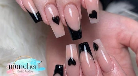 Elegant nail art with black heart design at Moncheri Hand & Foot Spa Cavan, Cavan, County Cavan, IE.