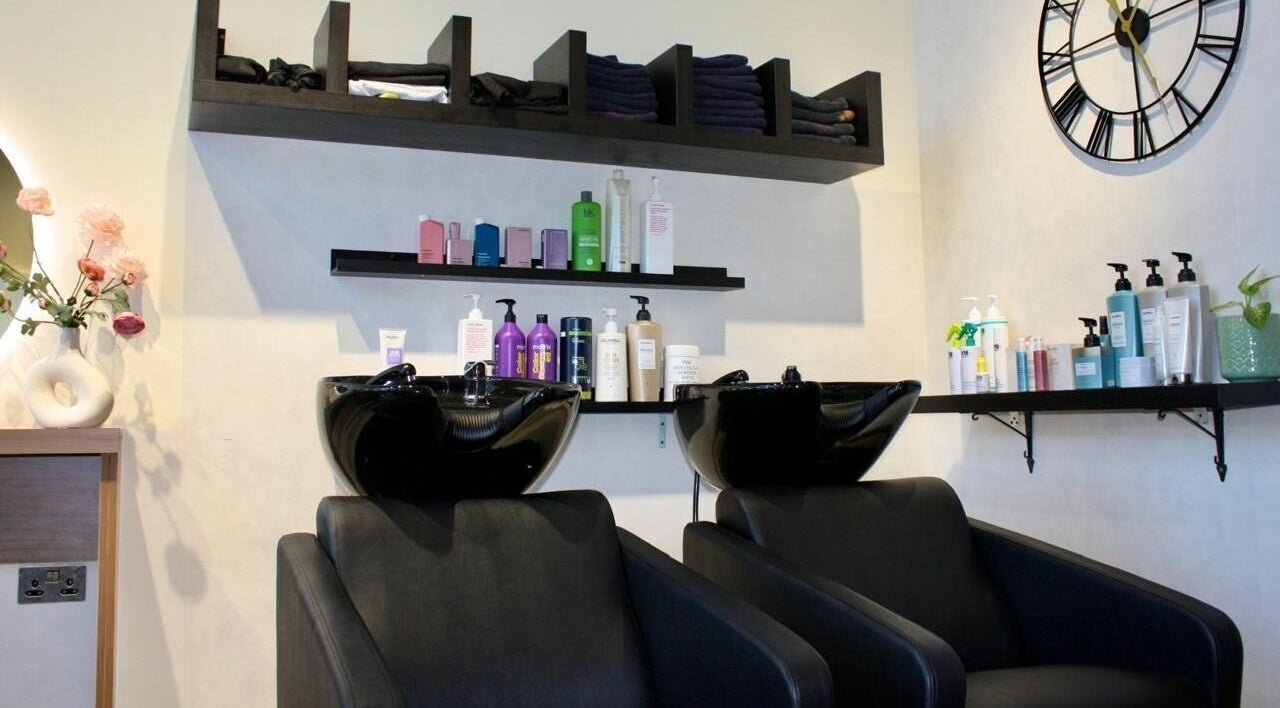 Stylish hair washing station at Freya Beauty Salon JVC, Dubai, Dubai, AE, featuring modern sinks and shelves.