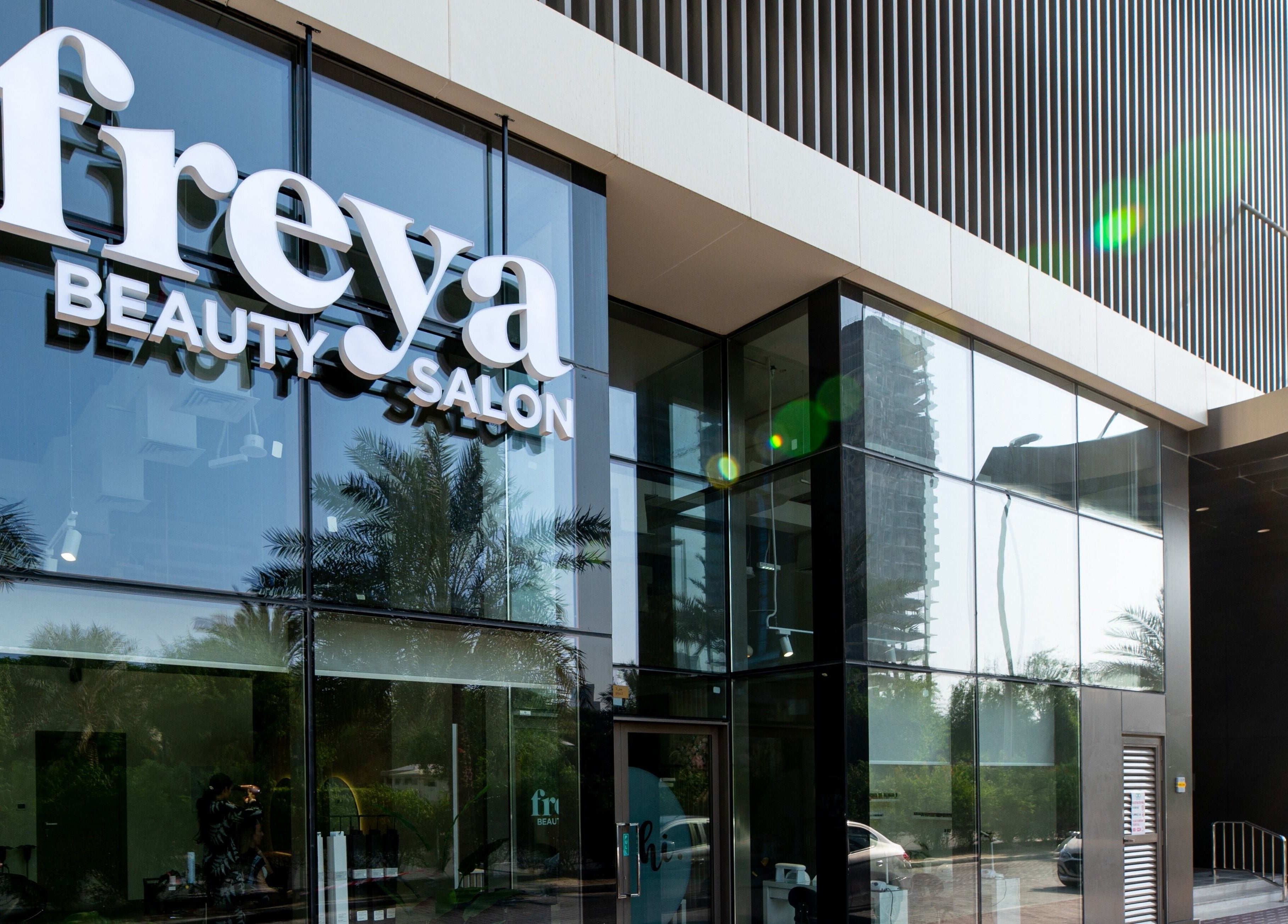 Freya Beauty Salon JVC exterior in Dubai, Dubai, AE with sleek modern design and reflective glass.