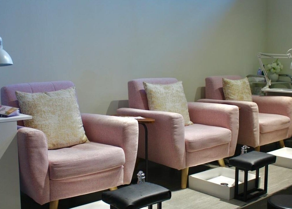 Elegant pink chairs at Freya Beauty Salon JVC, Dubai, Dubai, AE, perfect for relaxation and pampering.