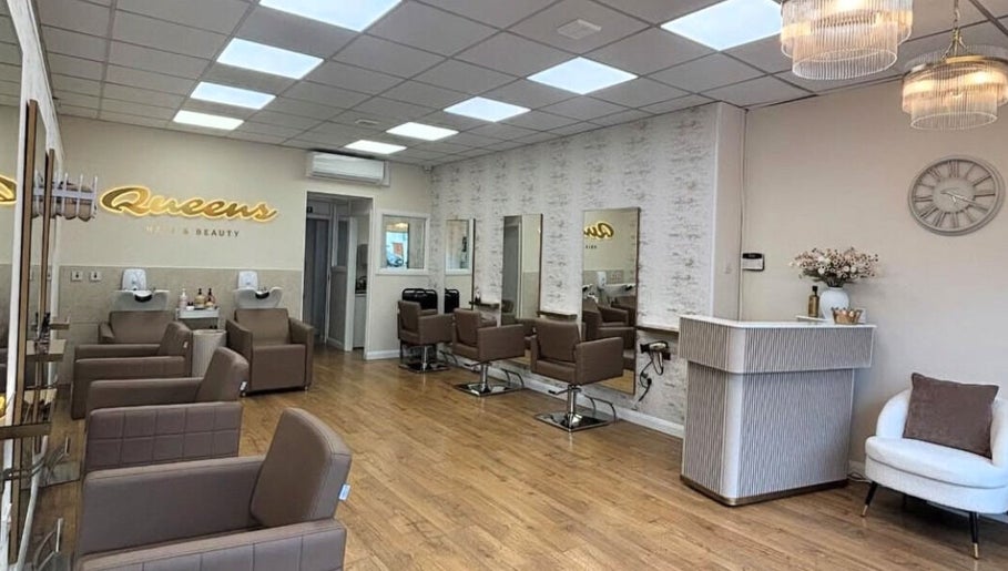 Modern chic interior of Sshh Hair at Poppys in Bristol, England, GB with stylish chairs and mirrors.